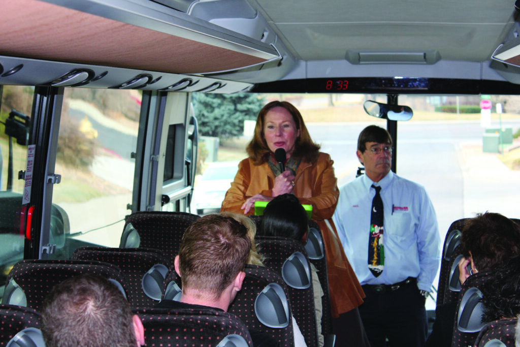 Tour director in the bus Donette