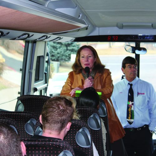 Tour director in the bus Donette