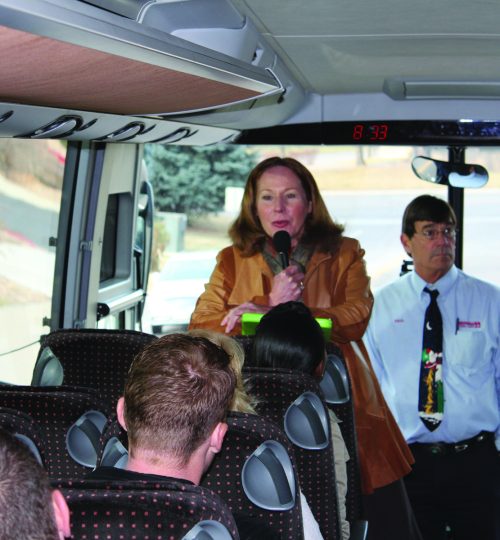 Tour director in the bus Donette